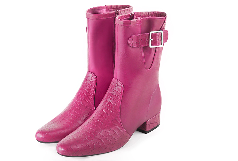 Fuschia pink women's ankle boots with buckles on the sides. Round toe. Low block heels. Front view - Florence KOOIJMAN